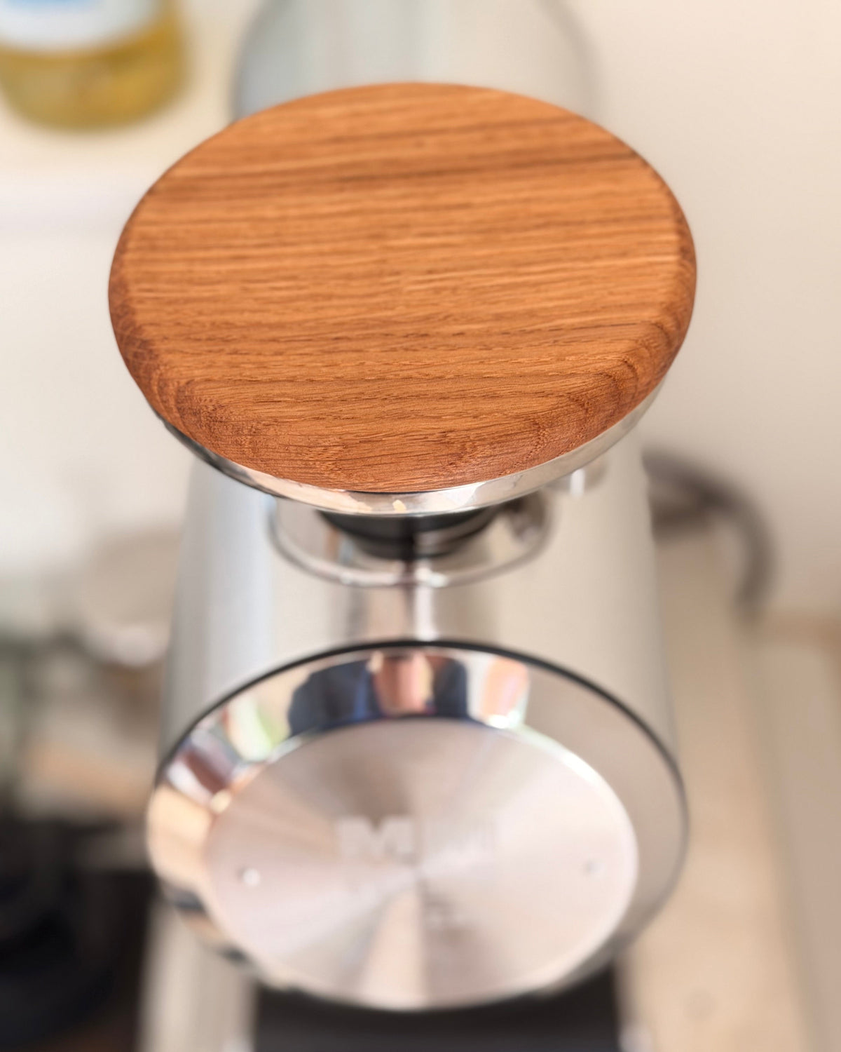Top view of the oak hopper lid fitted on a Mazzer Philos